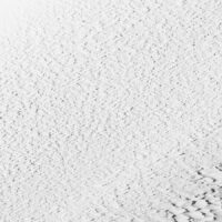 Skikjører koser seg i bunnløs snø, fotokunst veggbilde / plakat av Bård Basberg