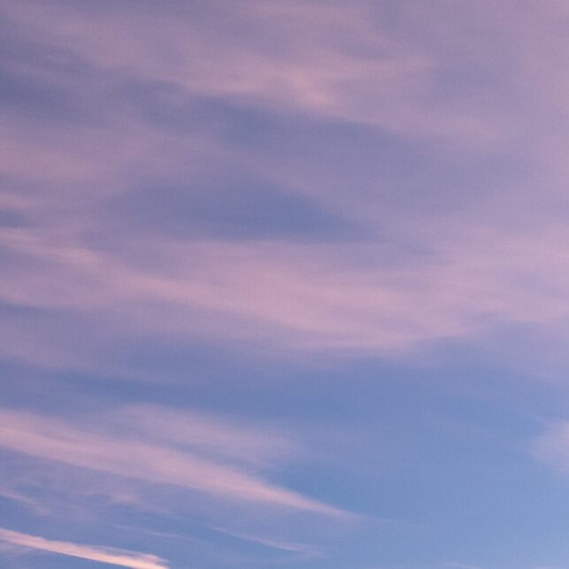 Steiner i hav med fargerike skyer, fotokunst veggbilde / plakat av Kristoffer Vangen