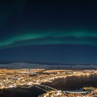 Nordlys over Tromsø, fotokunst veggbilde / plakat av Magne Tveiten